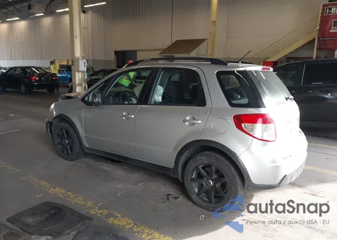 2010 Suzuki Sx4 Technology z USA, uszkodzony, nr VIN JS2YB5A39A6302670